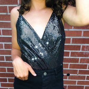 Silver sequined body suit